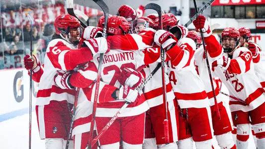 Terreirs celebrate Tamara Giaquinto's overtime goal against Merrimack