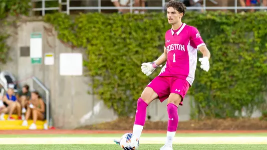 Goalkeeper Francesco Montali has the ball at his foot looking to pass from the BU box at Nickerson Field.