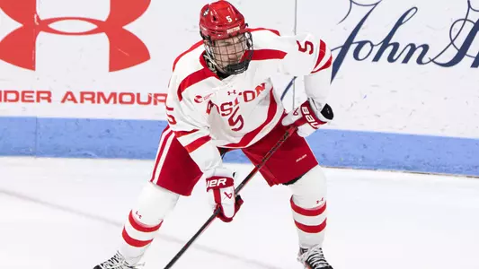 Tom Willander passing the puck