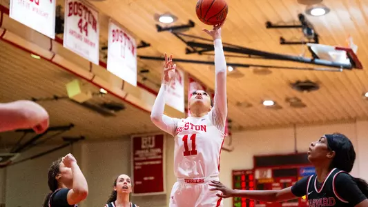 Photo of Caitlin Weimar scoring her 1,000th career point.