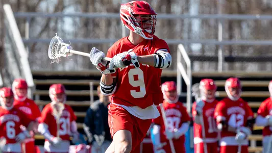 Tommy Jepson playing lacrosse