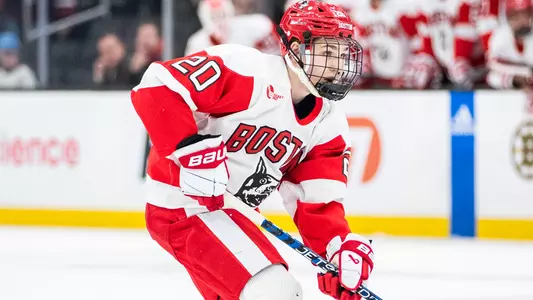 Lane Hutson playing hockey