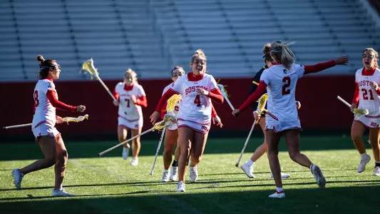 WLAX Celebrates a goal vs Merrimack
