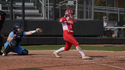 Lauren Keleher makes contact with a pitch batting left handed.