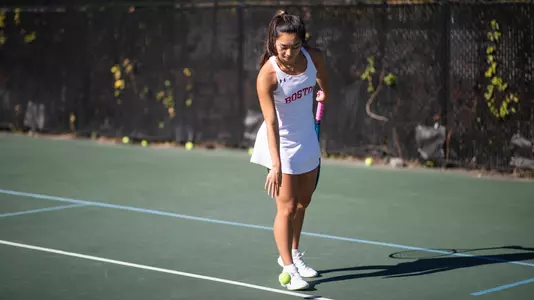 Kaitlin Tan about to serve