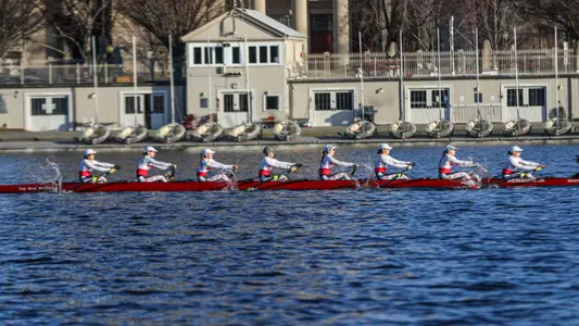 Photo of the Lightweight Rowing V8 racing in the 2023 Beanpot.