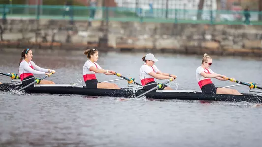 Photo of the Women's Rowing 2V8 racing against Northeastern.