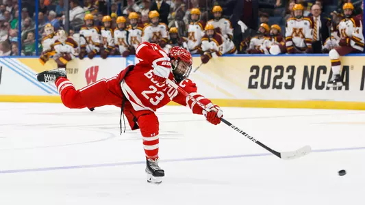 Domenick Fensore shoots the puck against Minnesota in the Frozen Four Semifinal