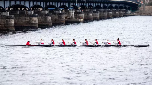 Photo of the women's rowing 2V8 racing against MIT.