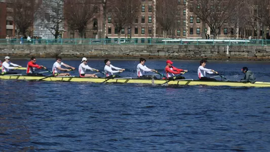Photo of the Men's Rowing 4V8 racing against Harvard and Brown.