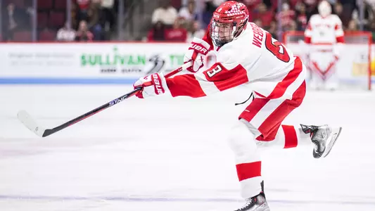 Cade Webber shooting the puck