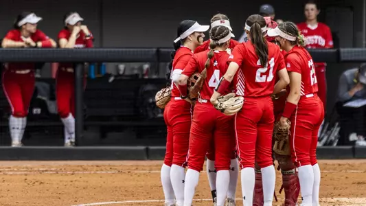 The BU infield huddles in the circle at the 2023 NCAA Athens Regional.