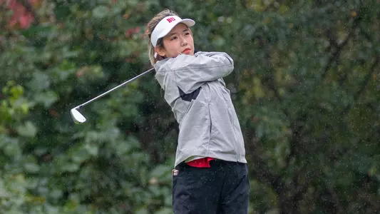 Christy Chen hits an iron shot at the 2023 Red Bandanna Intercollegiate