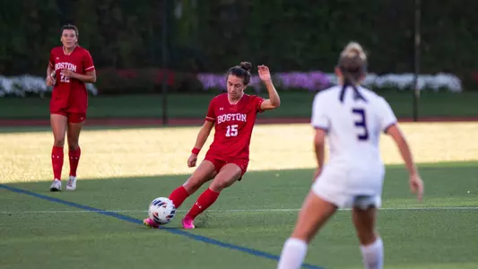 Photo of women's soccer sophomore Giulianna Gianino kicking the ball against UAlbany.