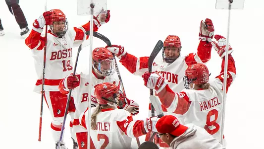 Terriers celebrate a goal by Maggie Hanzel in a victory over Vermont
