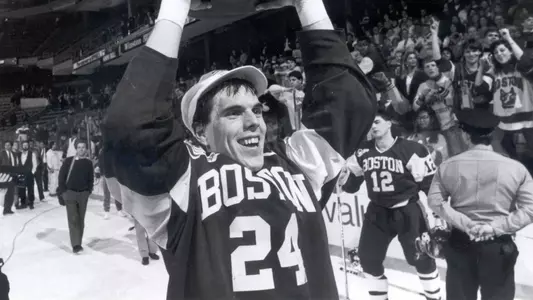 Mike Sullivan lifts the Beanpot after winning in 1990