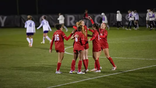 Photo of the BU Women's Soccer team celebrating its win over Holy Cross on Oct. 16, 2024.