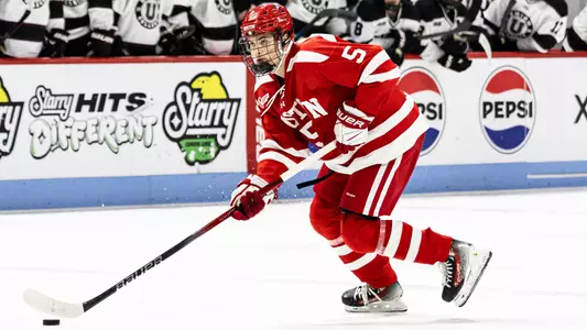 Tom Willander skating with the puck