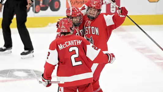 BU men's ice hockey players celebrate a goal at North Dakota
