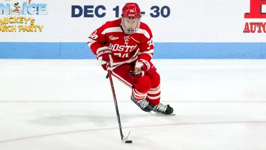 Cole Eiserman skating with the puck