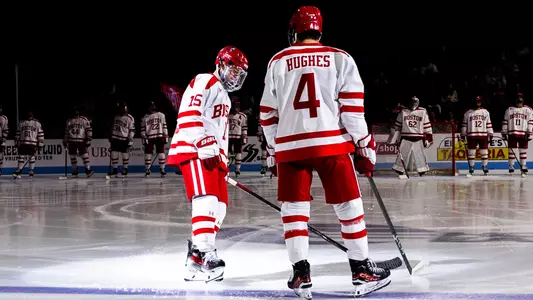 Matt Copponi skating to the blue line as he's introduced before a game at Agganis Arena. Jack Hughes is already on the blue line