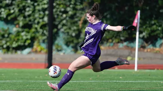 Photo of women's soccer freshman Bridget Carr on a goal kick at Nickerson Field.