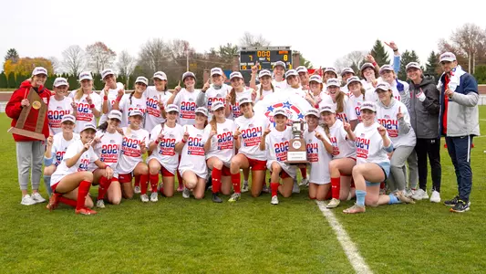 Women's Soccer team poses with 2024 Patriot League trophy