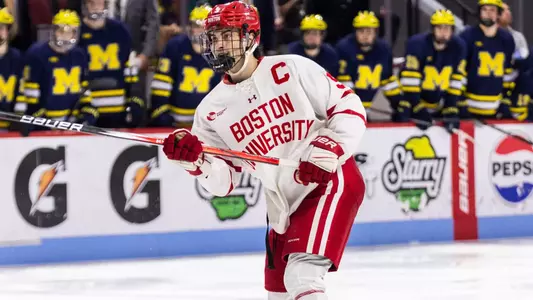 Ryan Greene shooting a puck
