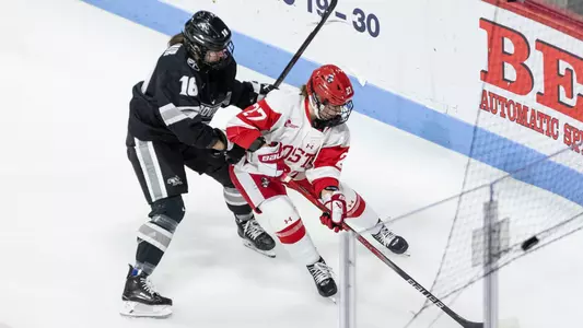 Keira Healey playing hockey against Providence