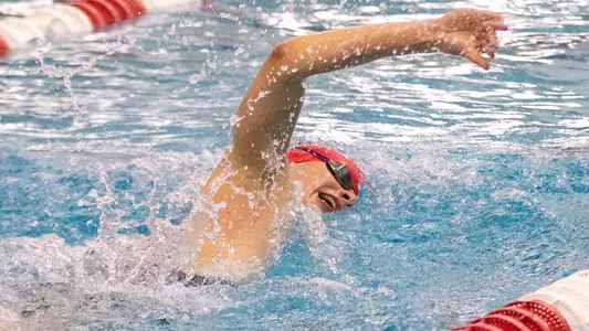 Charles Schreiner swimming at 2024 Terrier Invite
