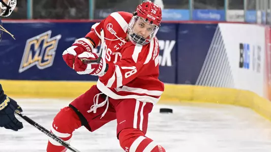 Sascha Boumedienne shooting a puck