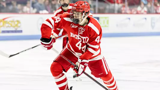 Cole Hutson playing hockey