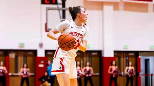 Photo of women's basketball sophomore Audrey Ericksen holding the ball at Case Gym.