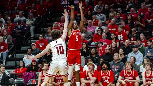 Kyrone Alexander attempts a 3-pointer at Rutgers in the corner