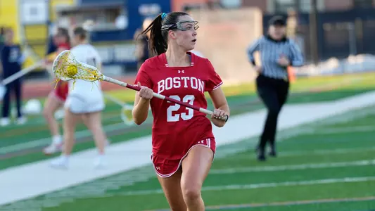 Hannah Tillier running with the ball at Merrimack
