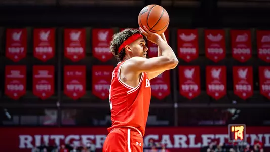 Ben Palacios attempts a 3-pointer from the corner.
