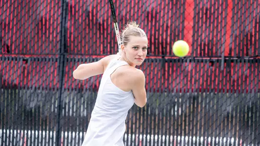 Uma Bakaityte winding up to hit ball