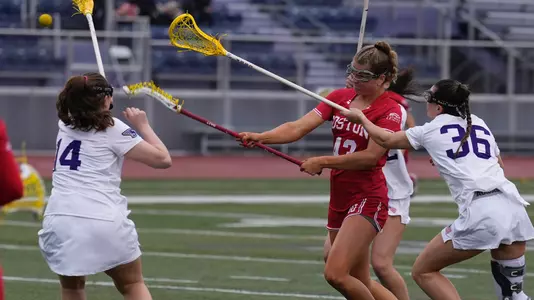 Elle Stevenson shoots ball at Stonehill
