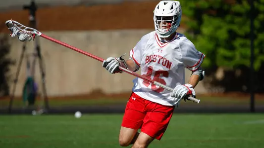 Dane DeGoler playing lacrosse