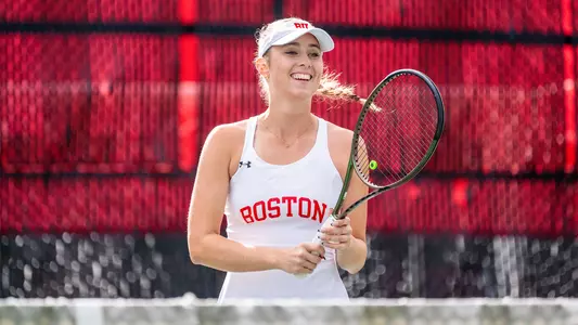 Victoria Carlsten smiling at the net