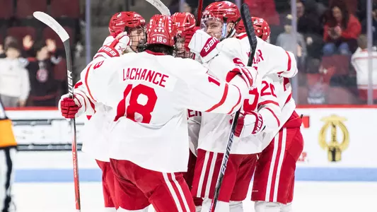 BU men's ice hockey players celebrating a goal