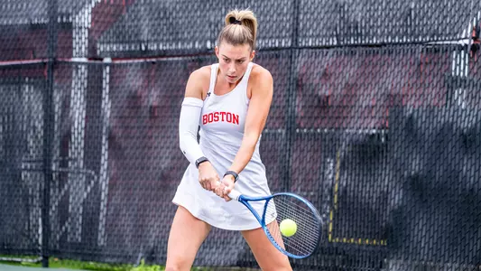 Michelle Kleynerman hits a forehand at the baseline