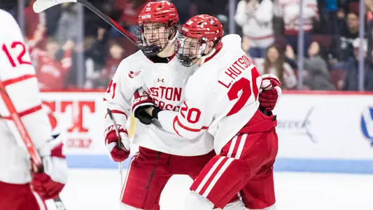 Lane Hutson and Macklin Celebrini celebrate a goal together