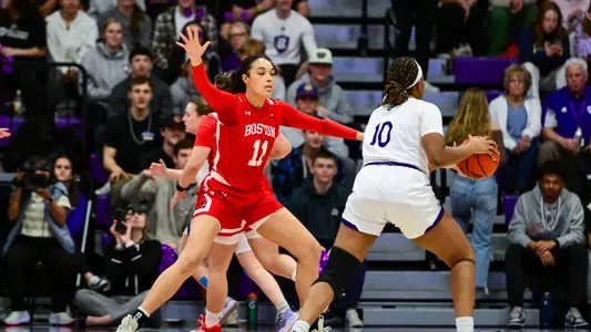 Photo of women's basketball senior Caitlin Weimar playing defense at the Patriot League Championship.