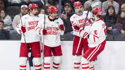 BU men's hockey players celebrating a goal