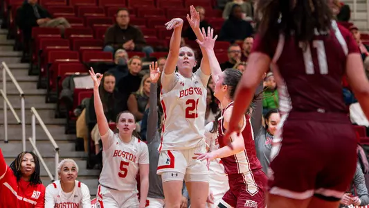 Photo of women's basketball freshman Audrey Ericksen shooting a three-pointer against Colgate.