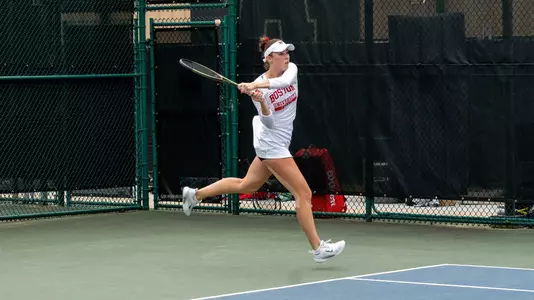 Victoria Carlsten follows through on a forehand at the Patriot League Championship