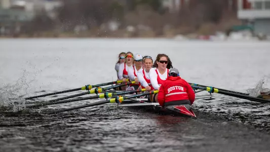Photo of the Women's Rowing 3rd Varsity 8 racing on the Charles River.