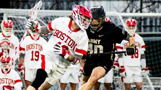 Jake Cates playing lacrosse against Army