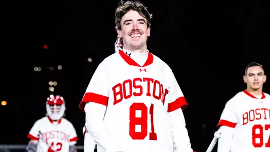 Kevin Barrett smiling on the field after a win
